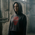 Model wearing the skull graphic cropped hoodie